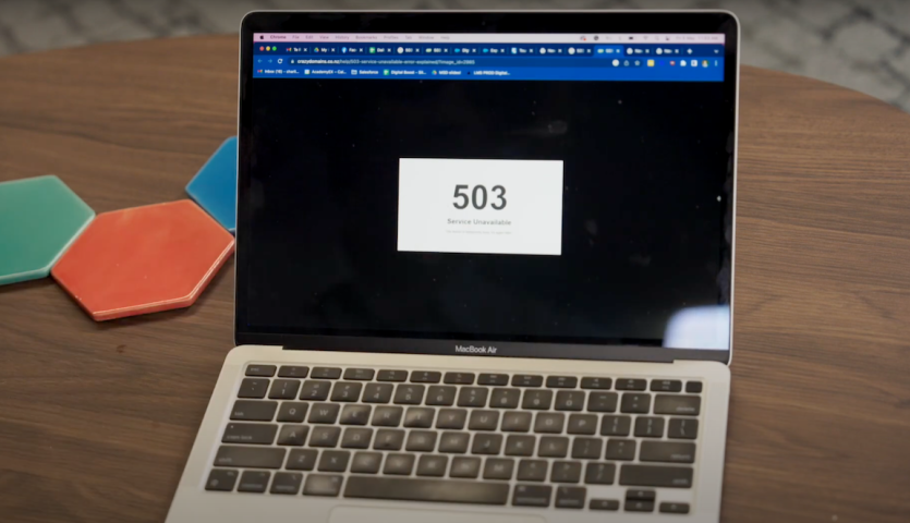 Laptop showing a 503 'service unavailable' web page.